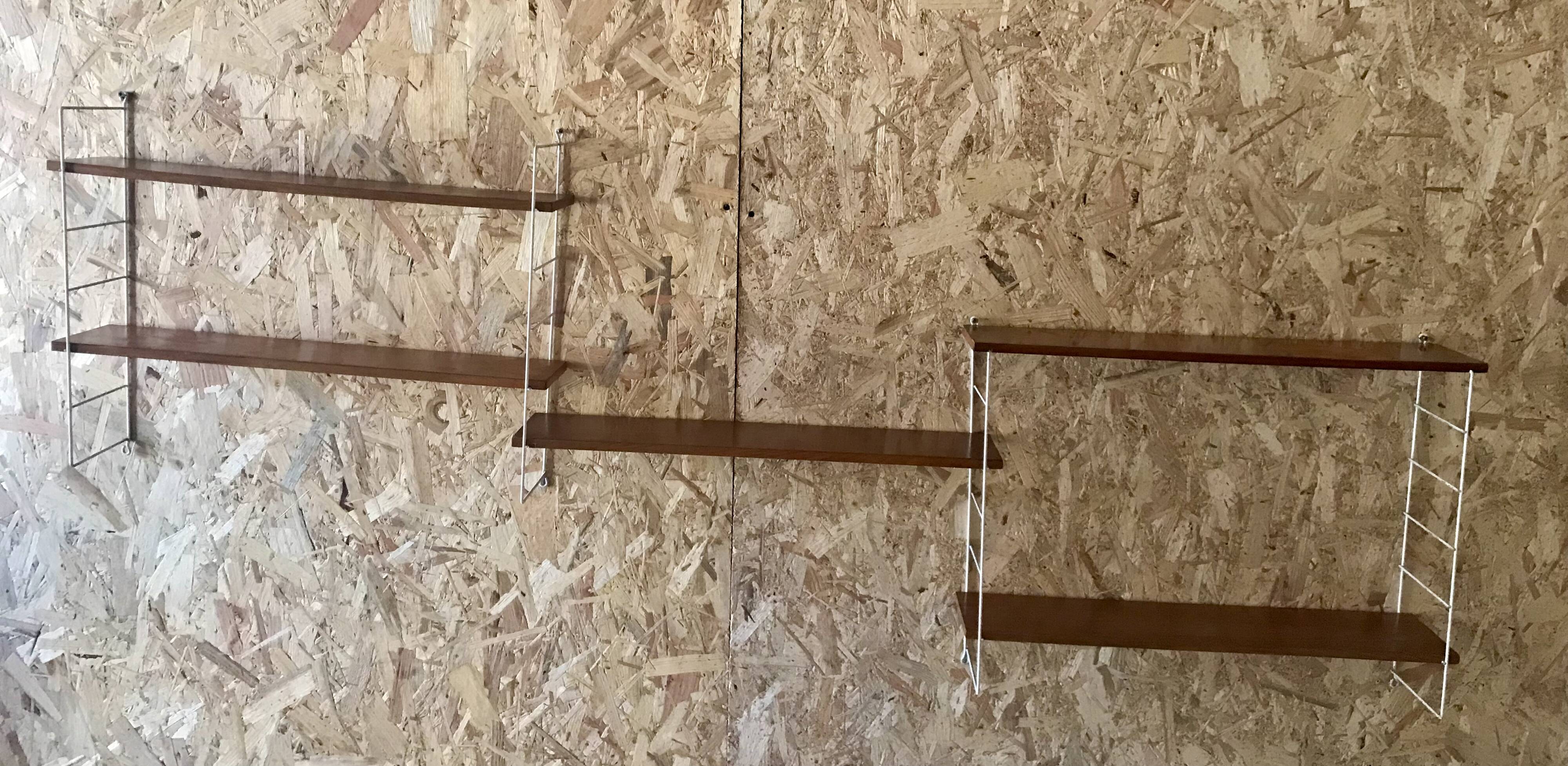 Vintage modular wall shelf with 4 supports and 5 levels.