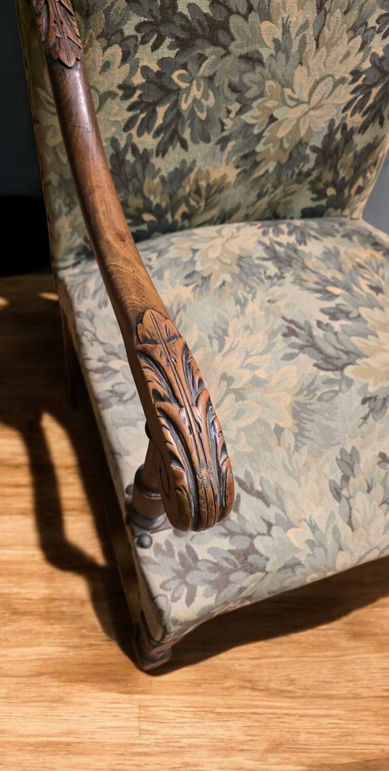 Empire armchair in carved wood and floral fabric