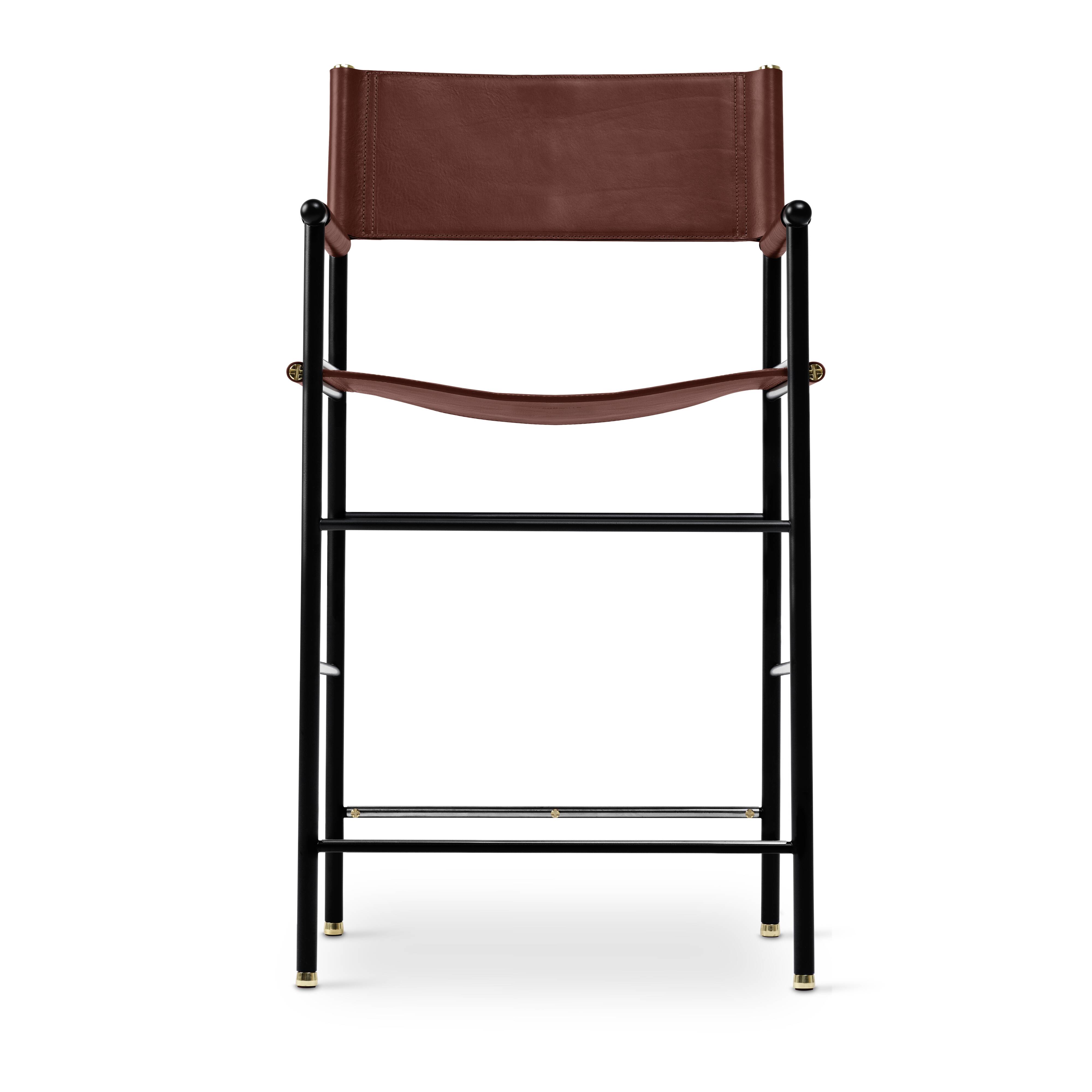 By contemporary classic bar stool with cognac leather backrest, black rubber, metal.