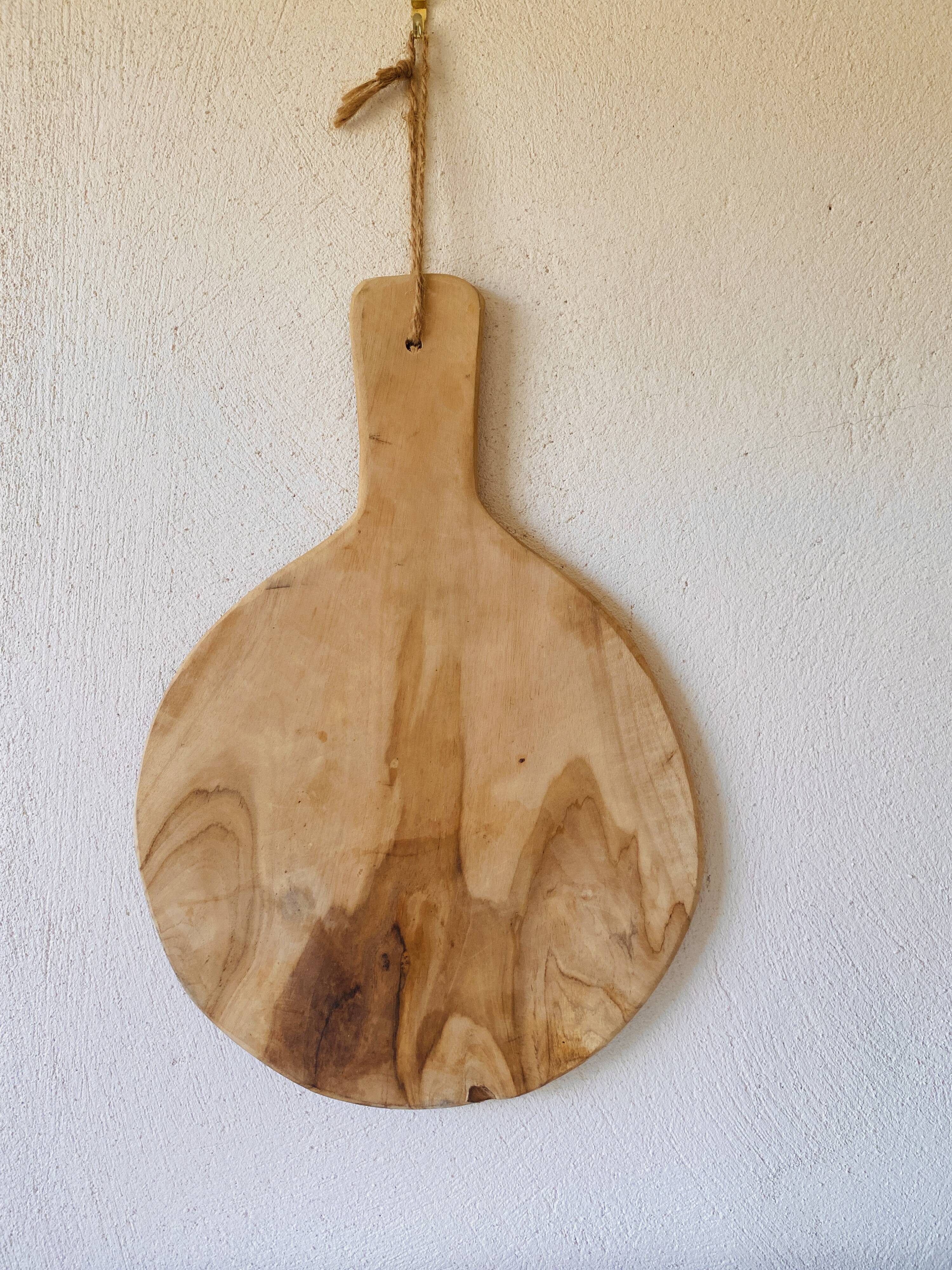 Cutting board, hanging rope