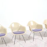 4 Eames DAX fiberglass lounge chairs with purple upholstery by Herman Mille