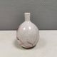 A vase in crackled porcelain with pink decoration. Germany 1930s