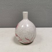 A vase in crackled porcelain with pink decoration. Germany 1930s