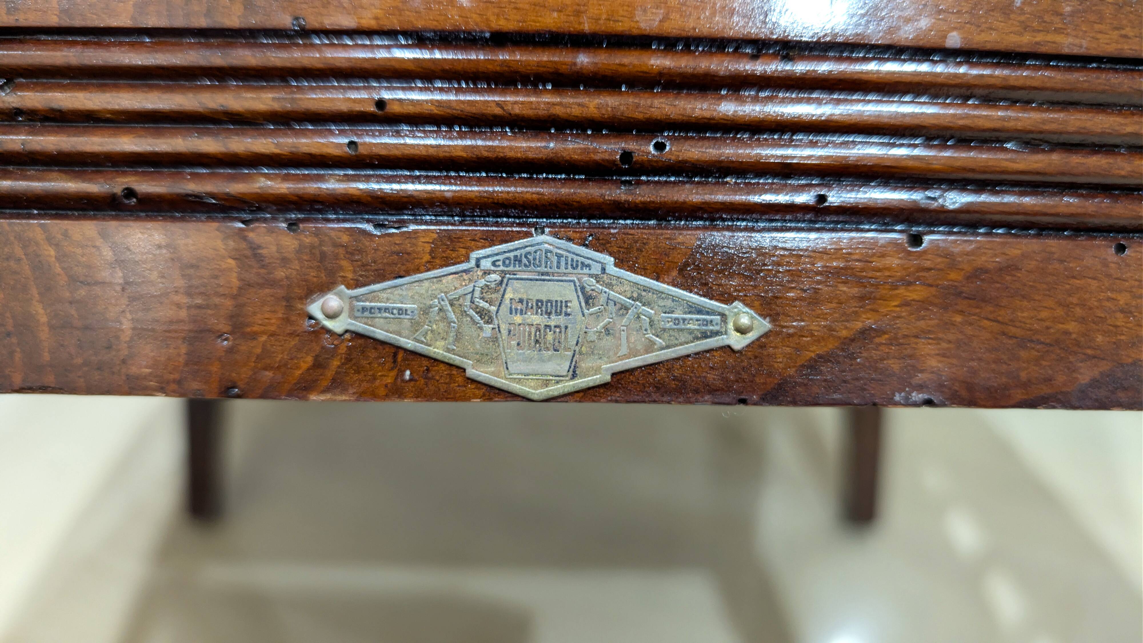 Armchair from the early 20th century signed Consortium Potacol.