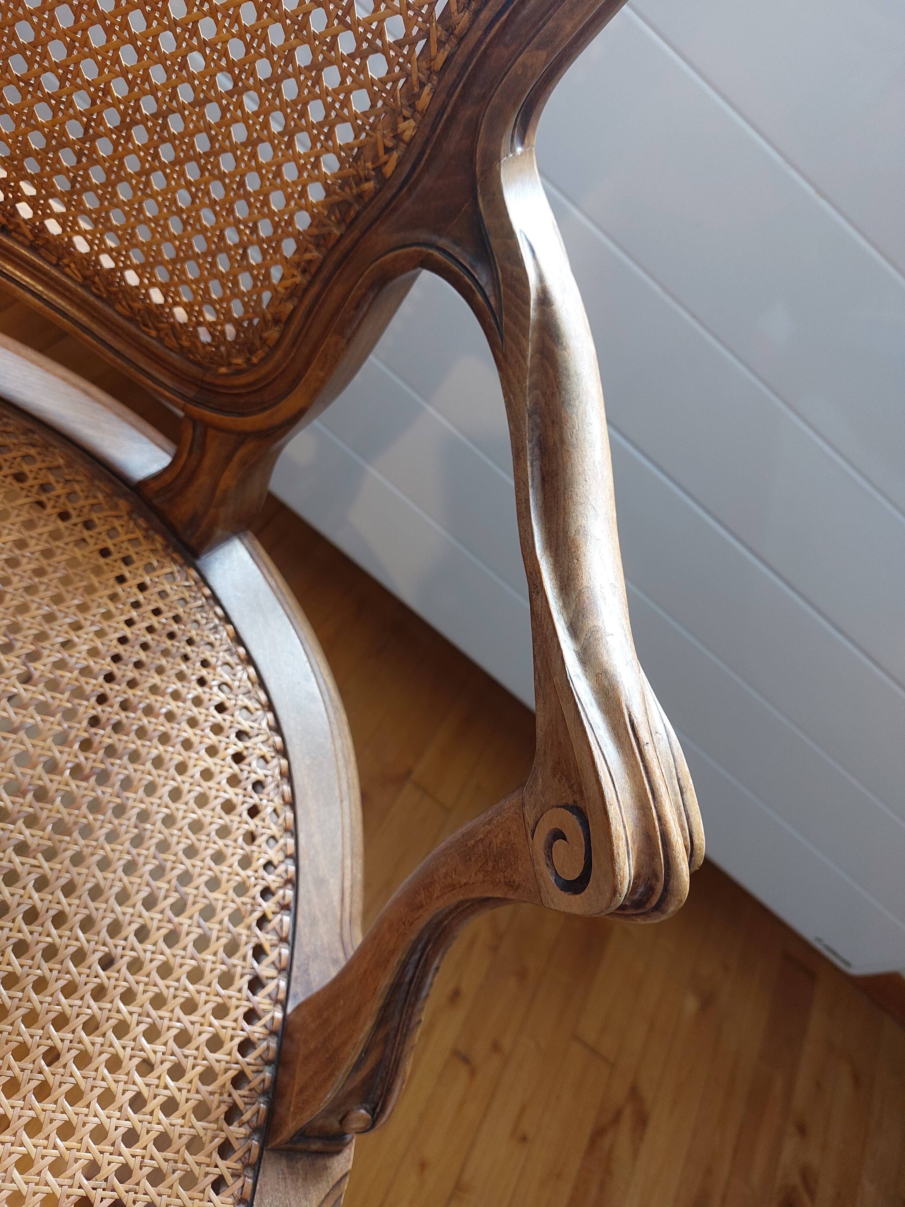 Louis XV style caned armchair