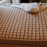 Walnut rocaille bed from the early 20th century.