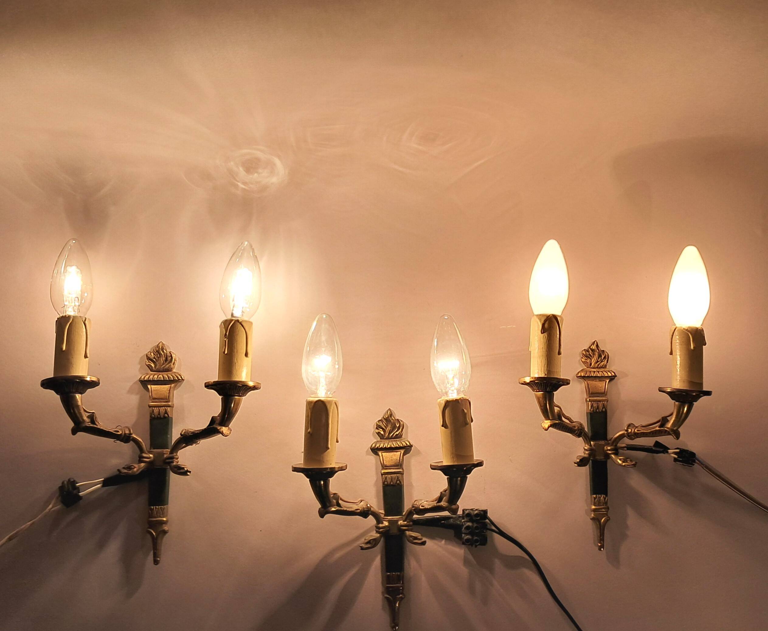 Set of 3 Empire style wall lights in bronze and gilded and green lacquered brass, Circa 1950.