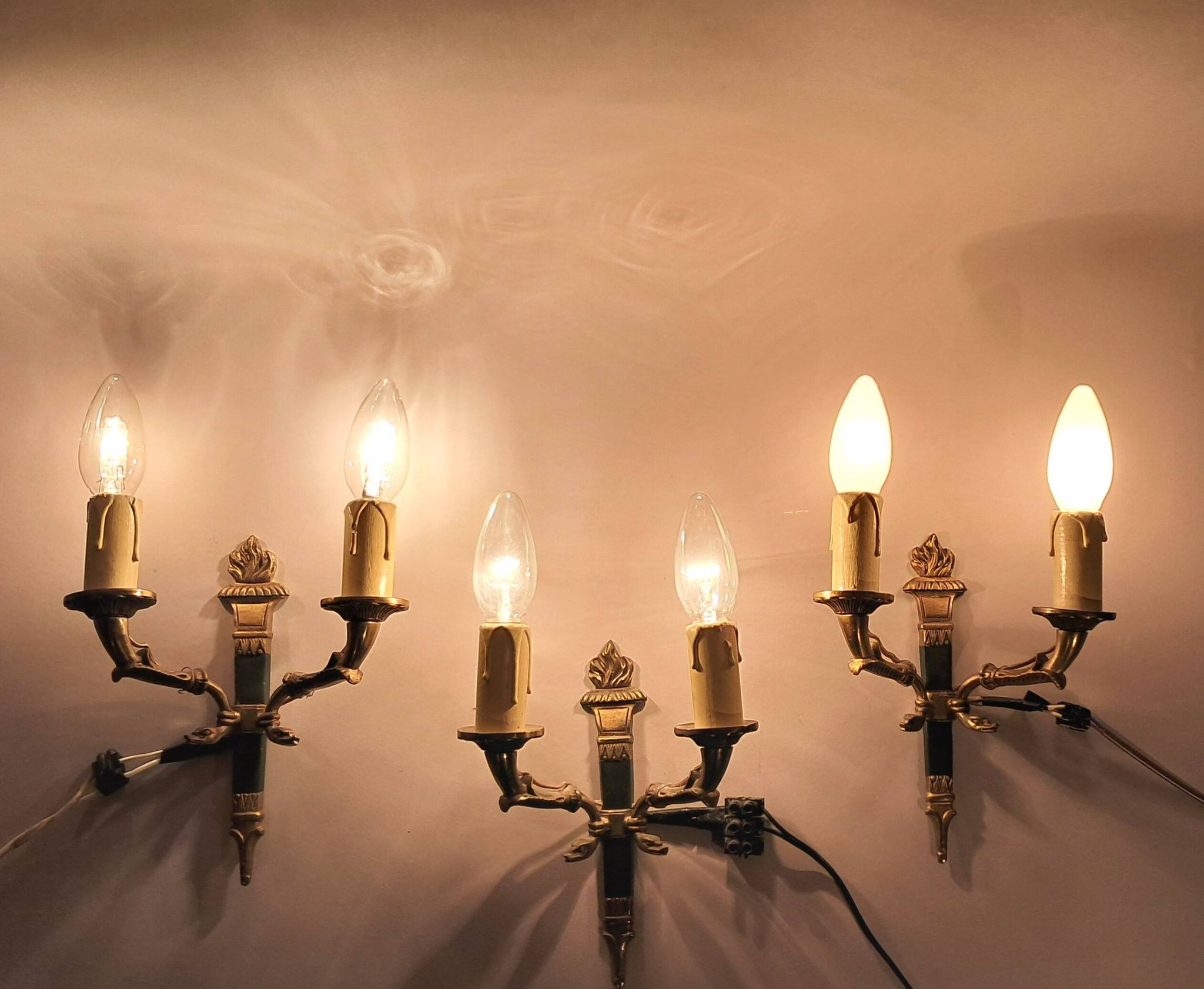 Set of 3 Empire style wall lights in bronze and gilded and green lacquered brass, Circa 1950.