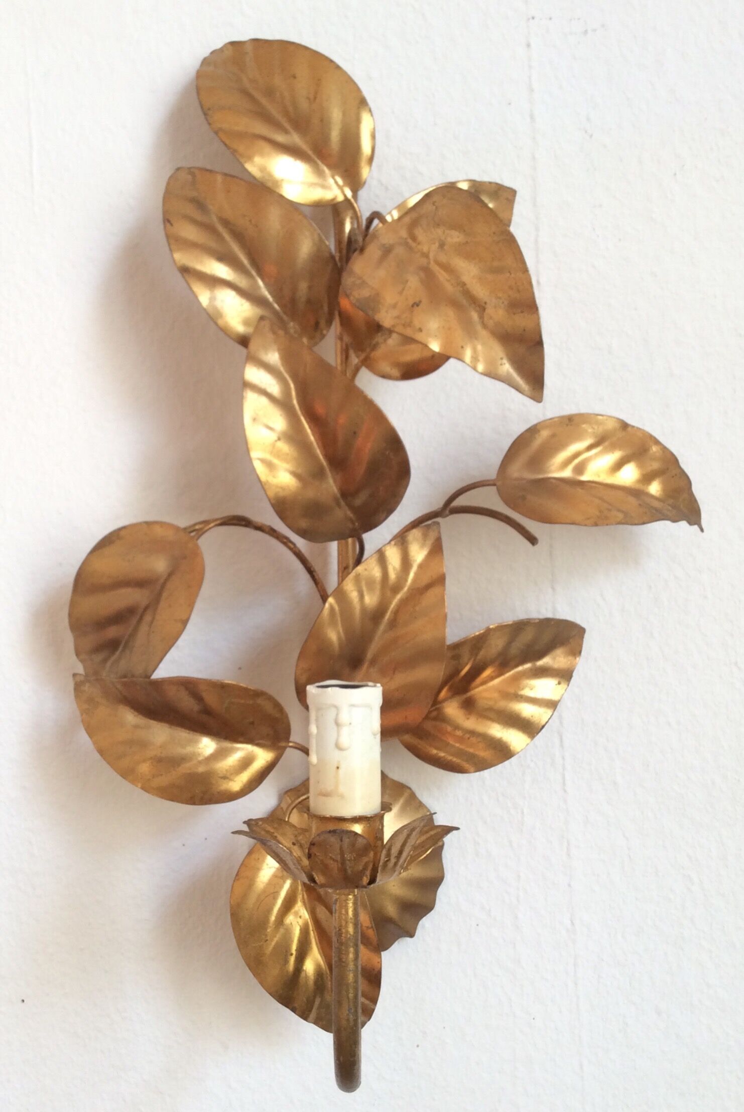 Apply gold metal sheets, Hans Kolg