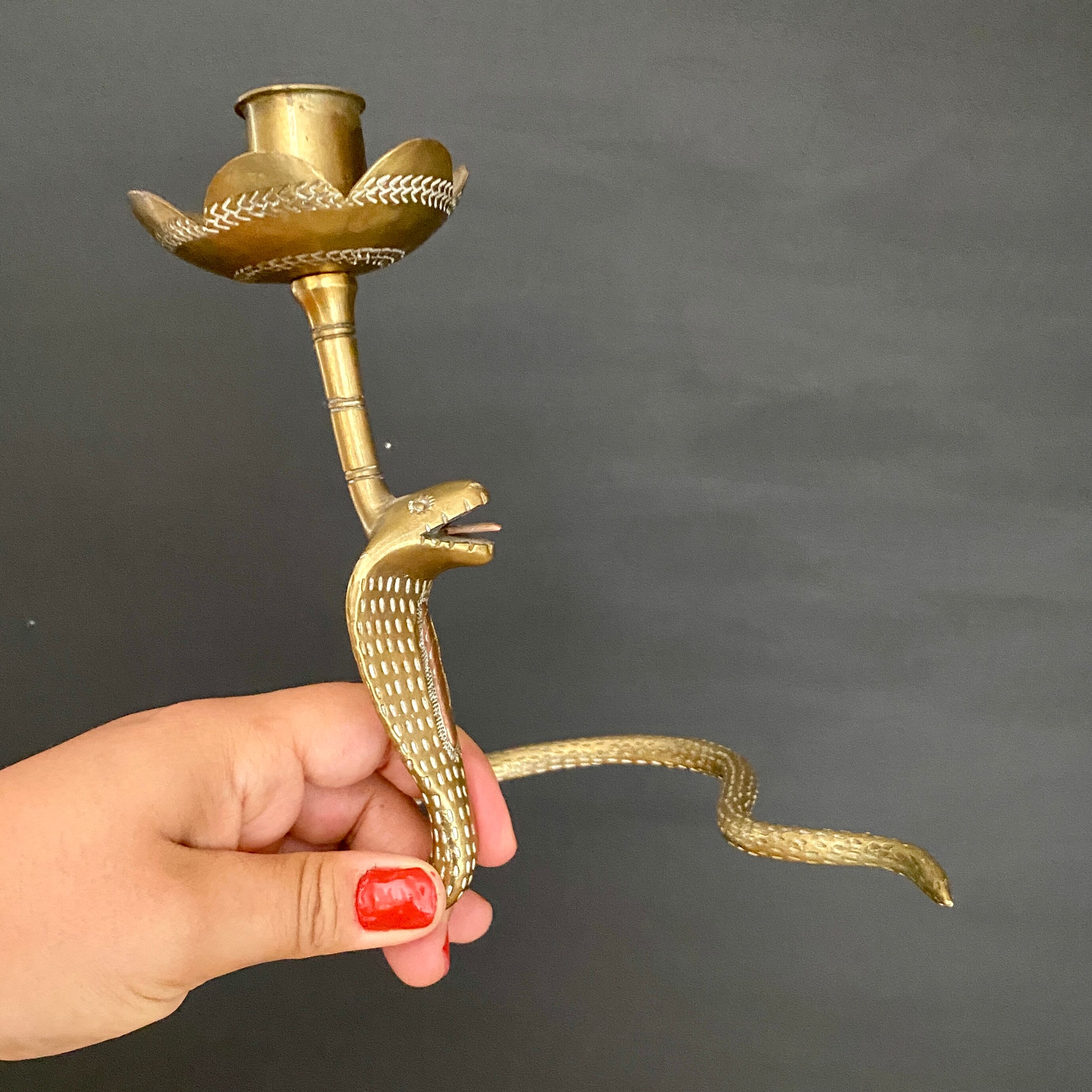 Brass candle holder in the shape of cobra -snake