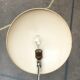 Metal table lamp model 6761 from the mid-century German period by Christian Dell for Kaiser Leuchten, 1960s.