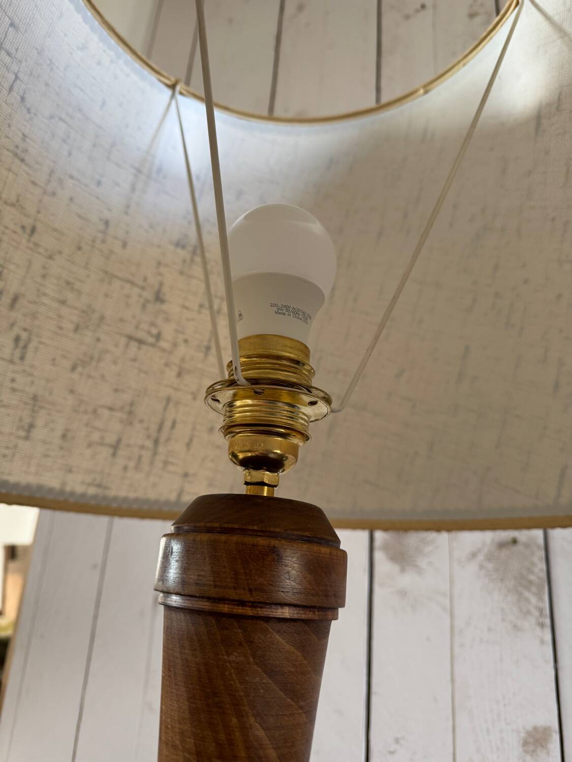 Turned wooden floor lamp