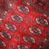 Tapis vintage fait main Tekke en laine rouge (109cm x 112cm) – Années 1970