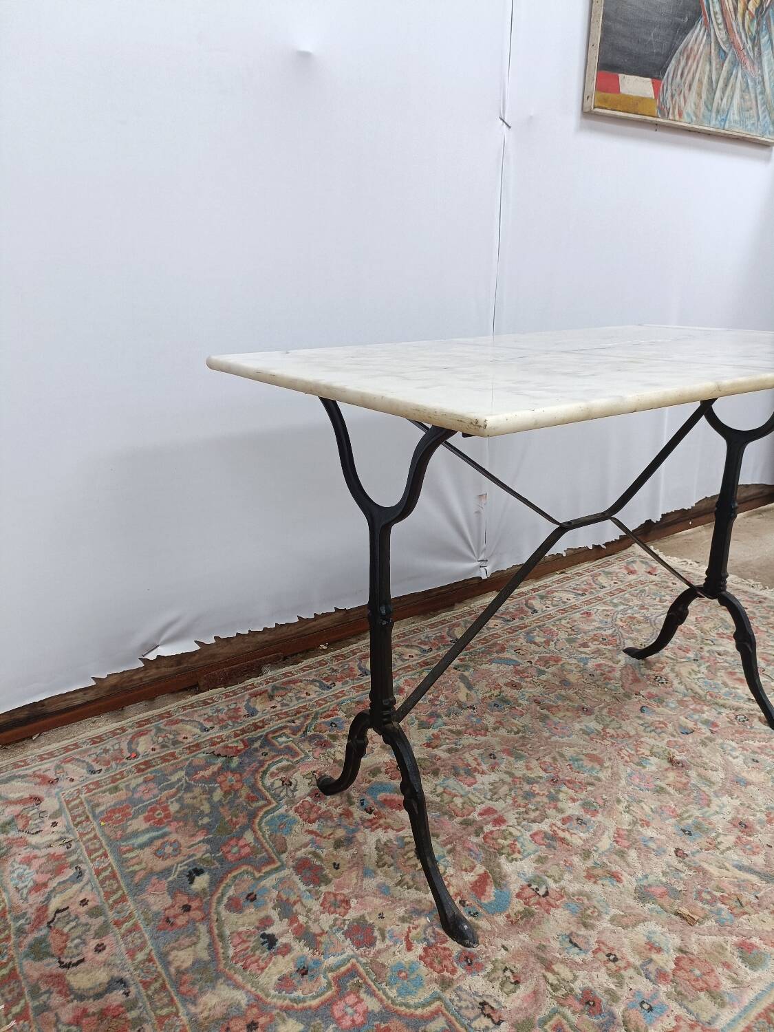 Bistro table with cast iron legs and marble top