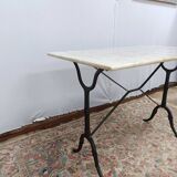 Bistro table with cast iron legs and marble top