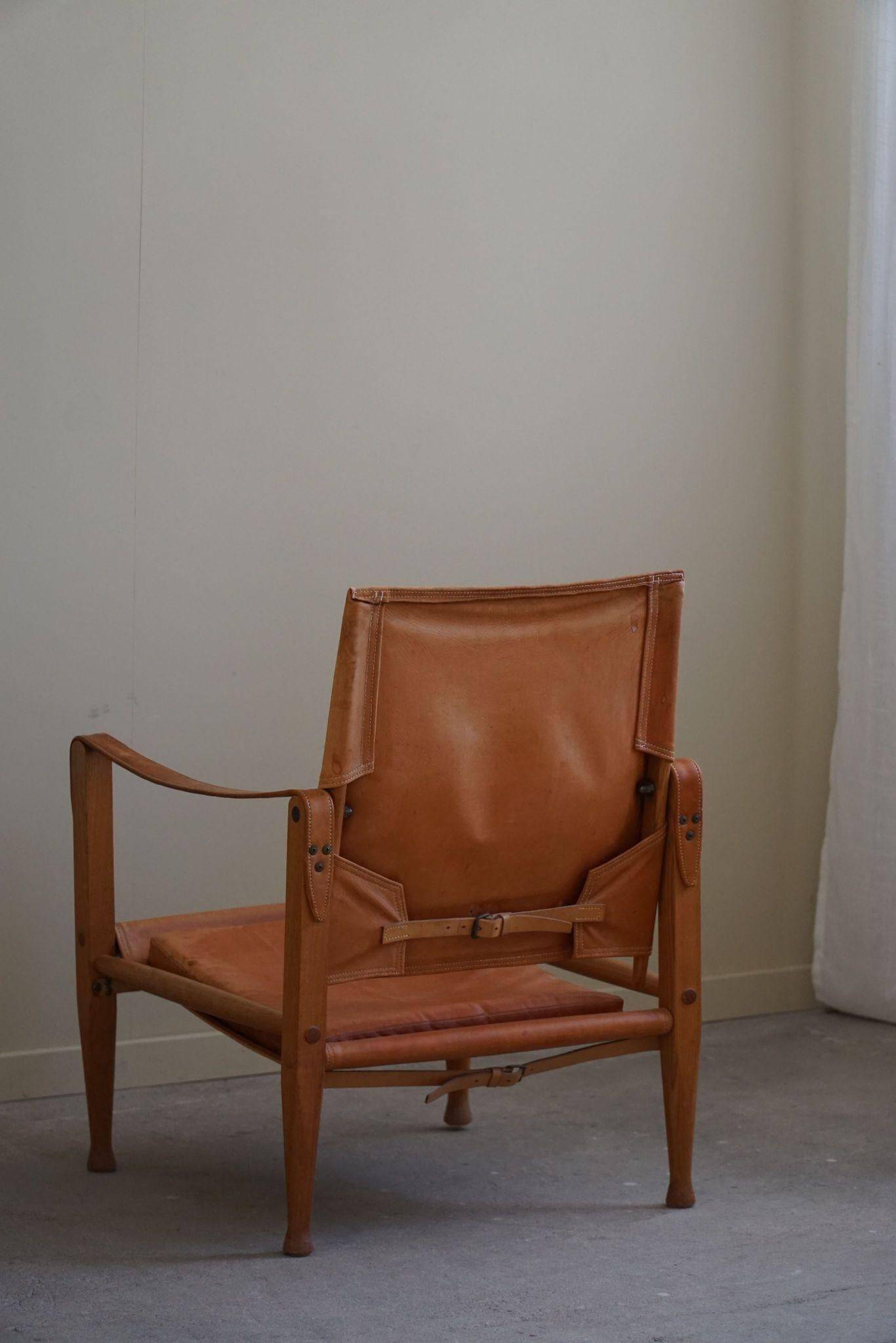 Kaare Klint, a pair of Safari chairs in ash and leather, Rud. Rasmussen, 1960s.
