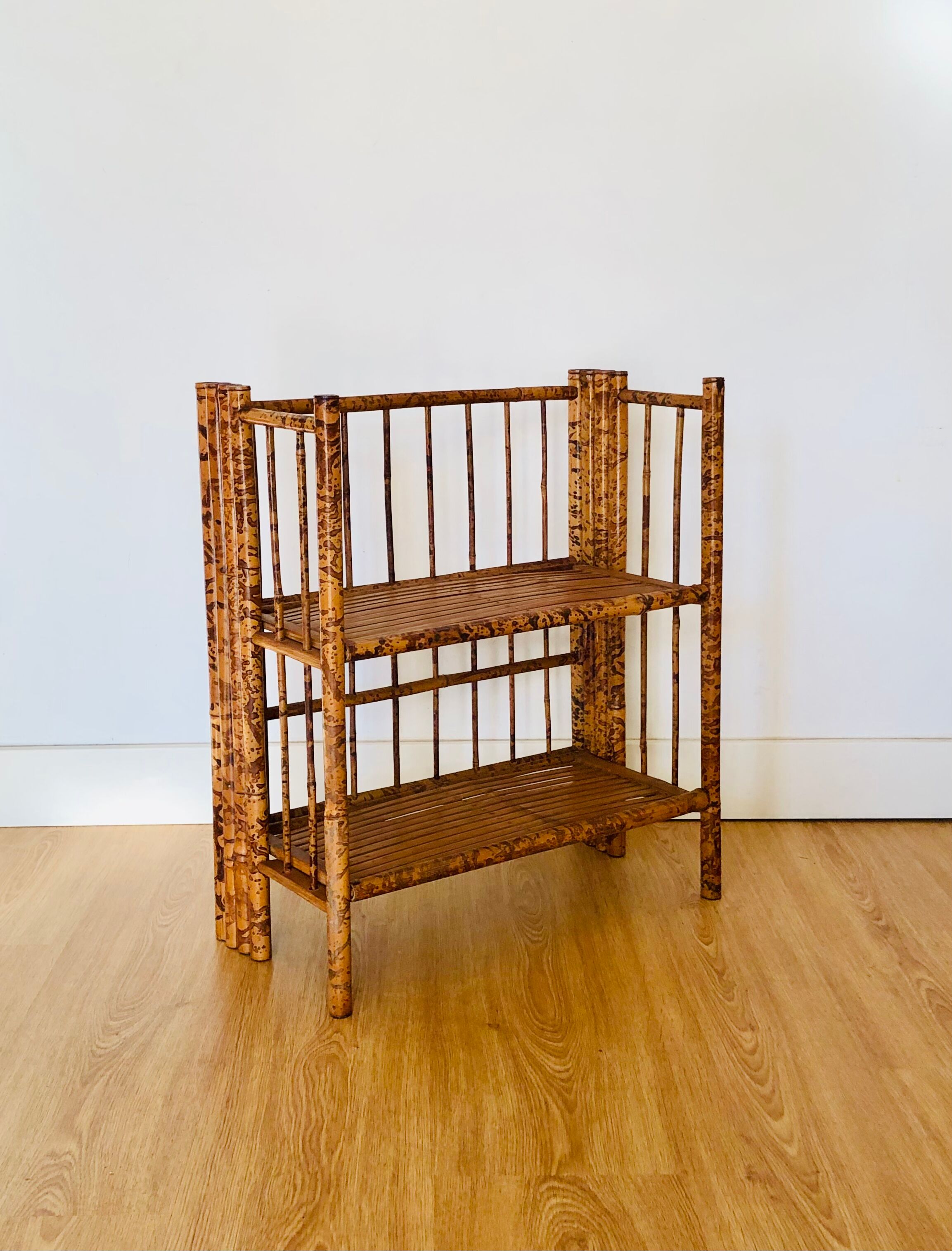 Folding speckled bamboo shelf