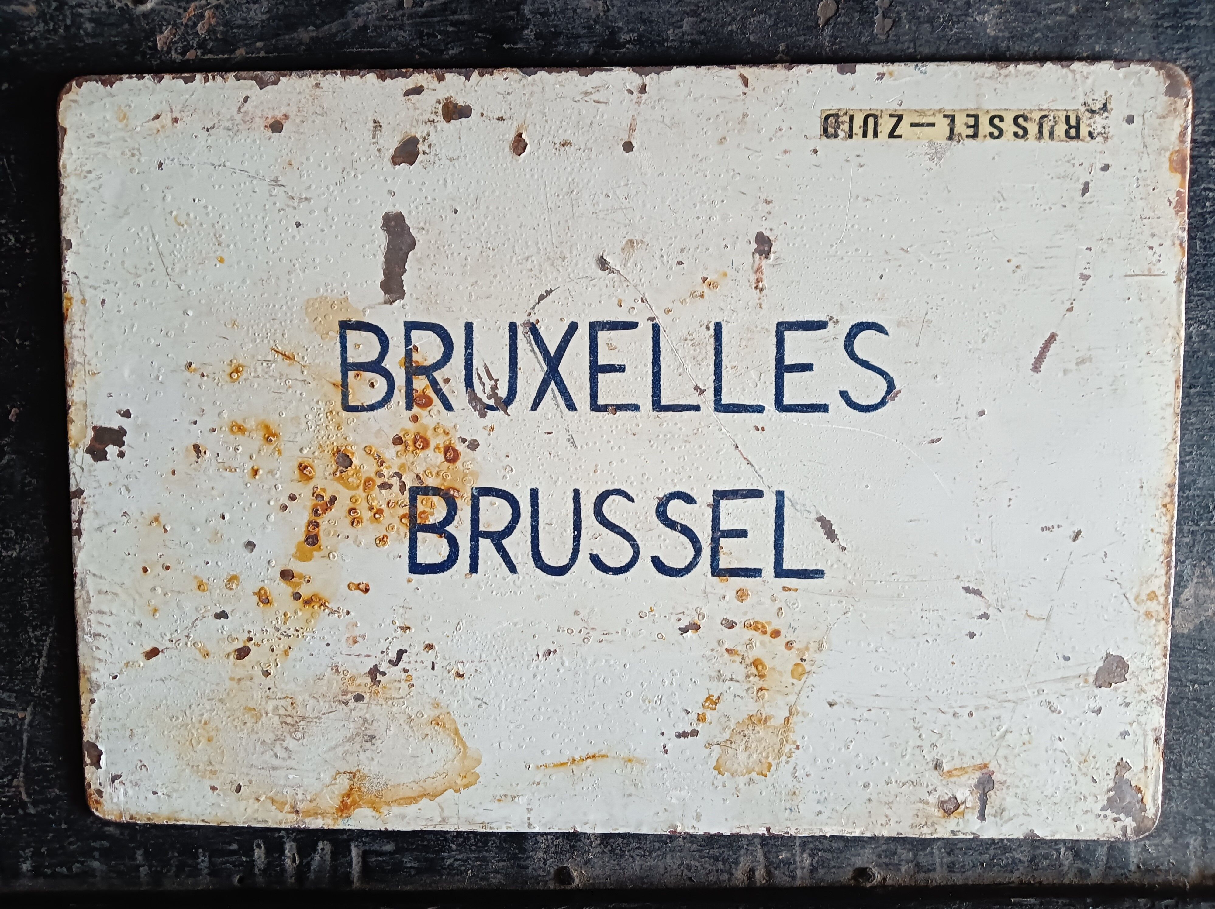 Destination plate of the "sncb" railway brussels - brussel and on the other side rimini,