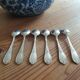 Small old silver metal spoons