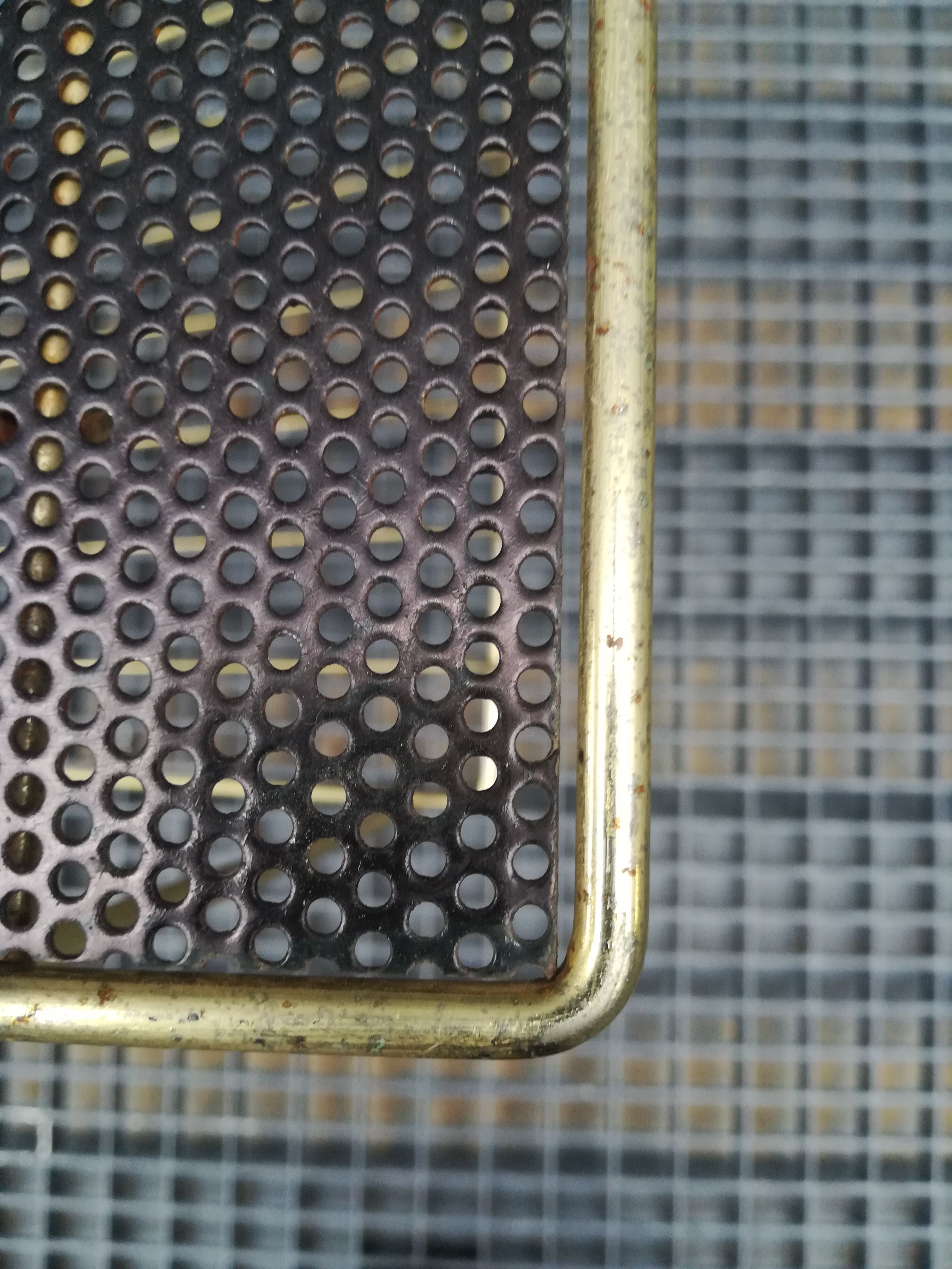 Gold sofa tip in perforated metal