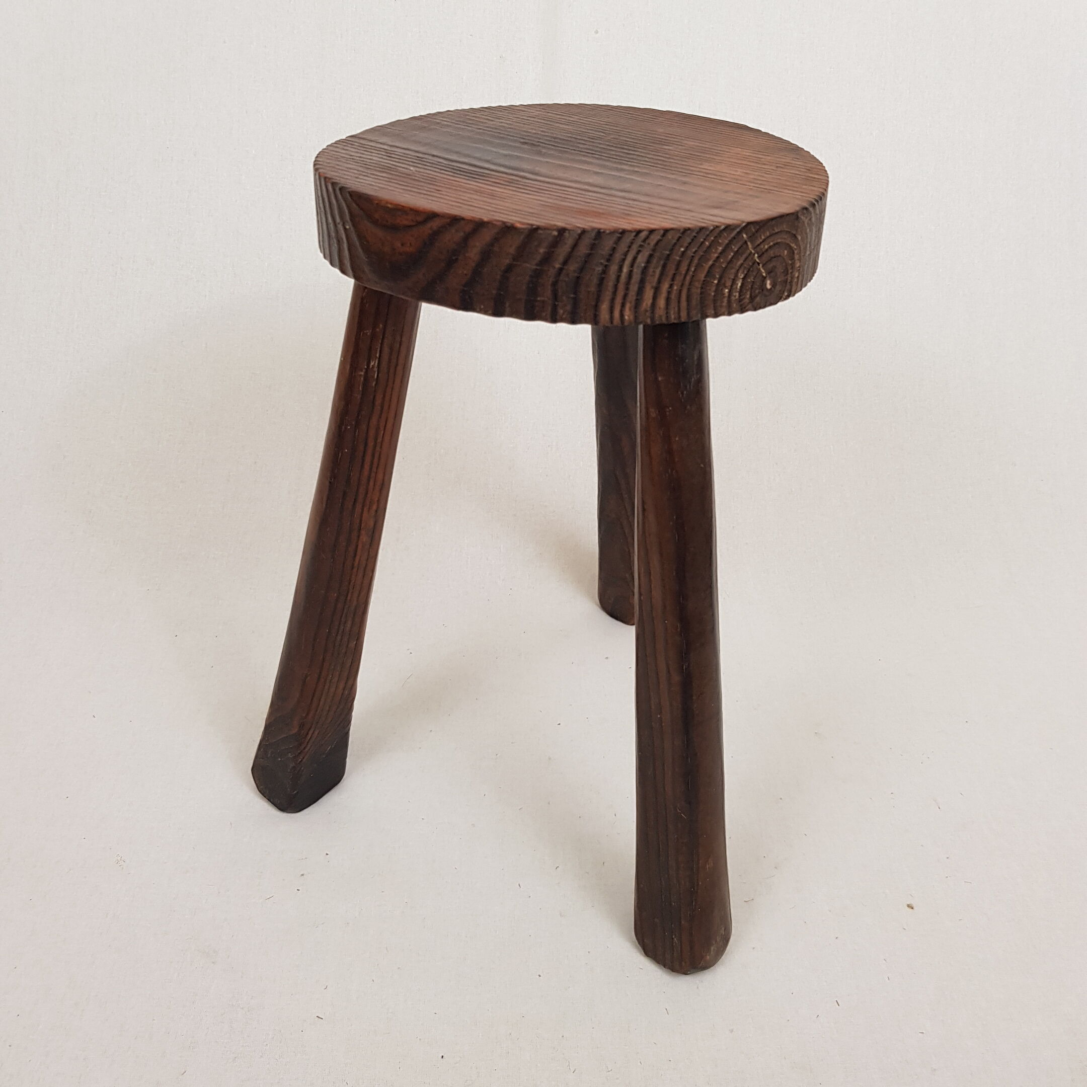 Wooden tripod stool