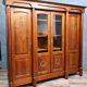 Empire library in cherry tree with blonde patina and gilded bronze around 1950