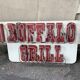 Buffalo Grill sign plate with neon
