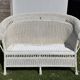 White rattan sofa