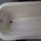 Cast iron island bathtub, on eagle-begged feet