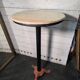 Bistro standing table with marble top and cast iron base.