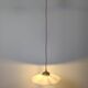 Vintage suspension in white opaline, elegant light fixture with soft light.