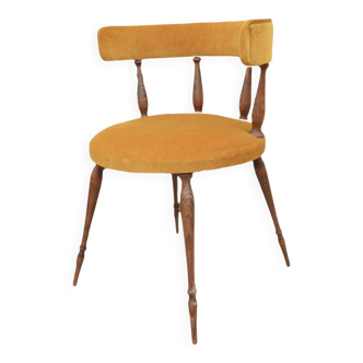 Mustard gondola armchair in the style of Helmut.