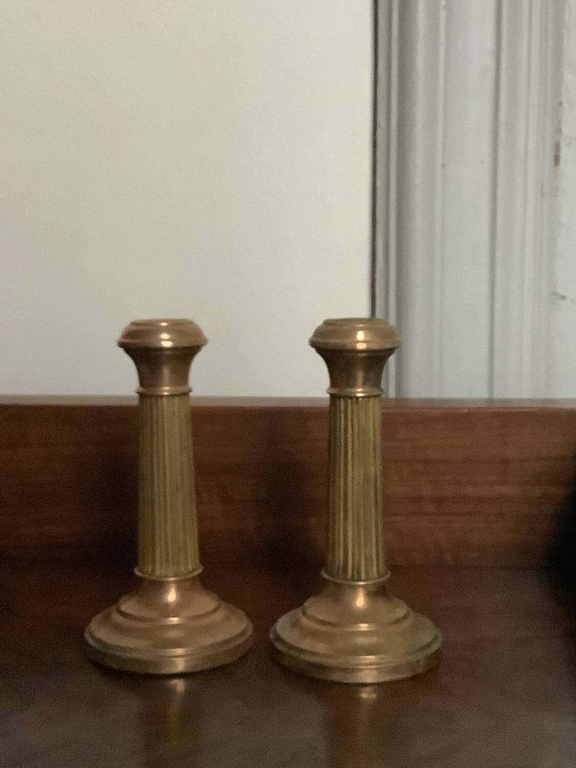 Duo of brass candlesticks