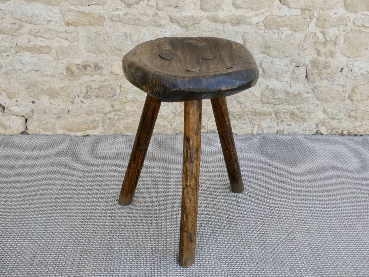 Tripod stool made of carved solid wood, handcrafted, around 1950.