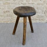 Tripod stool made of carved solid wood, handcrafted, around 1950.