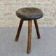 Tripod stool made of carved solid wood, handcrafted, around 1950.
