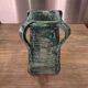 Vintage brutalist ceramic vase with 4 green handles.