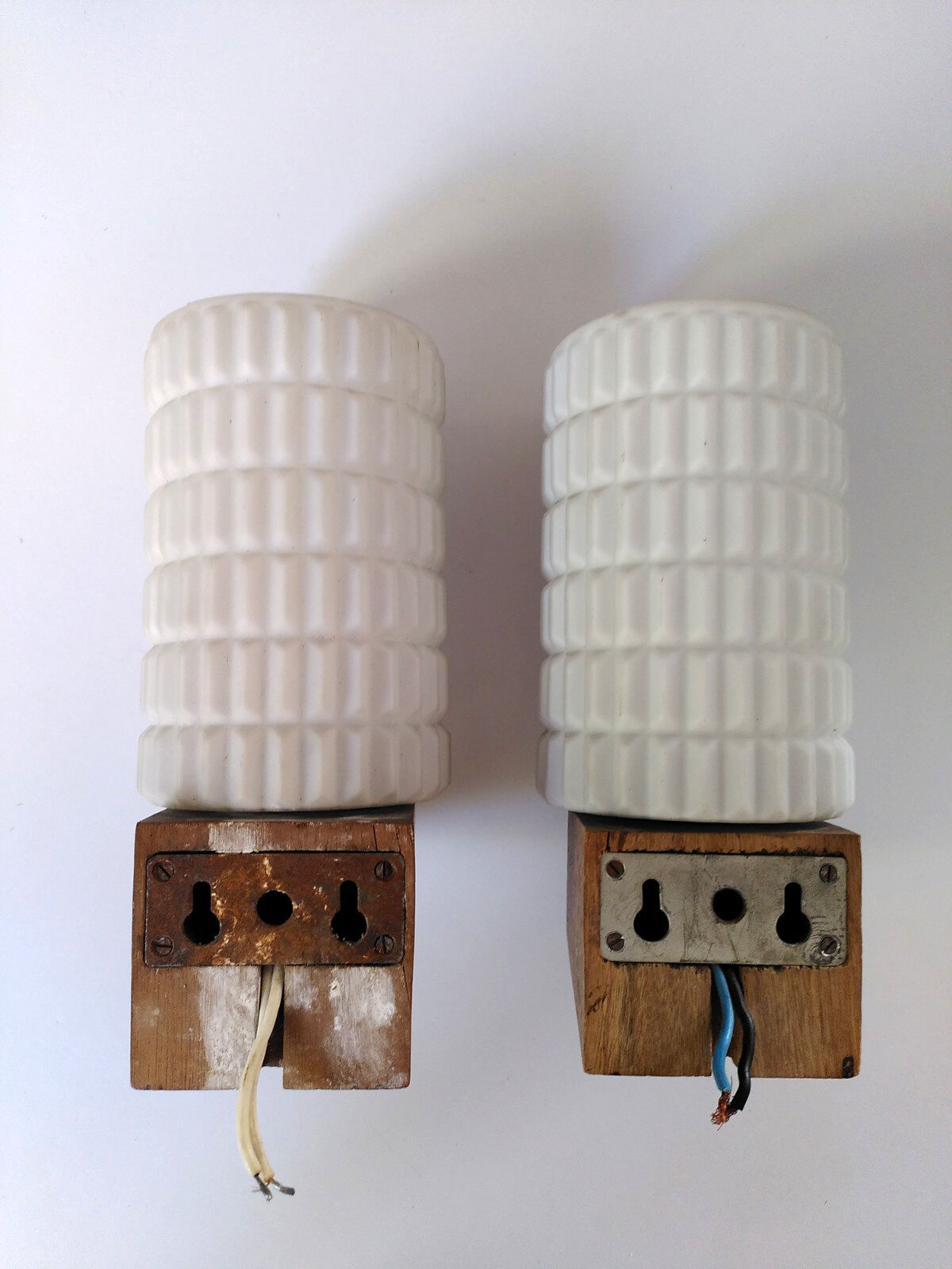 Opaline and teak sconces