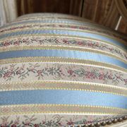 Pair of Louis XVI style chairs in painted wood and satin, classic elegance.