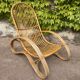Curved bamboo and rattan armchair in Italian style by Roberti from the 1960s.