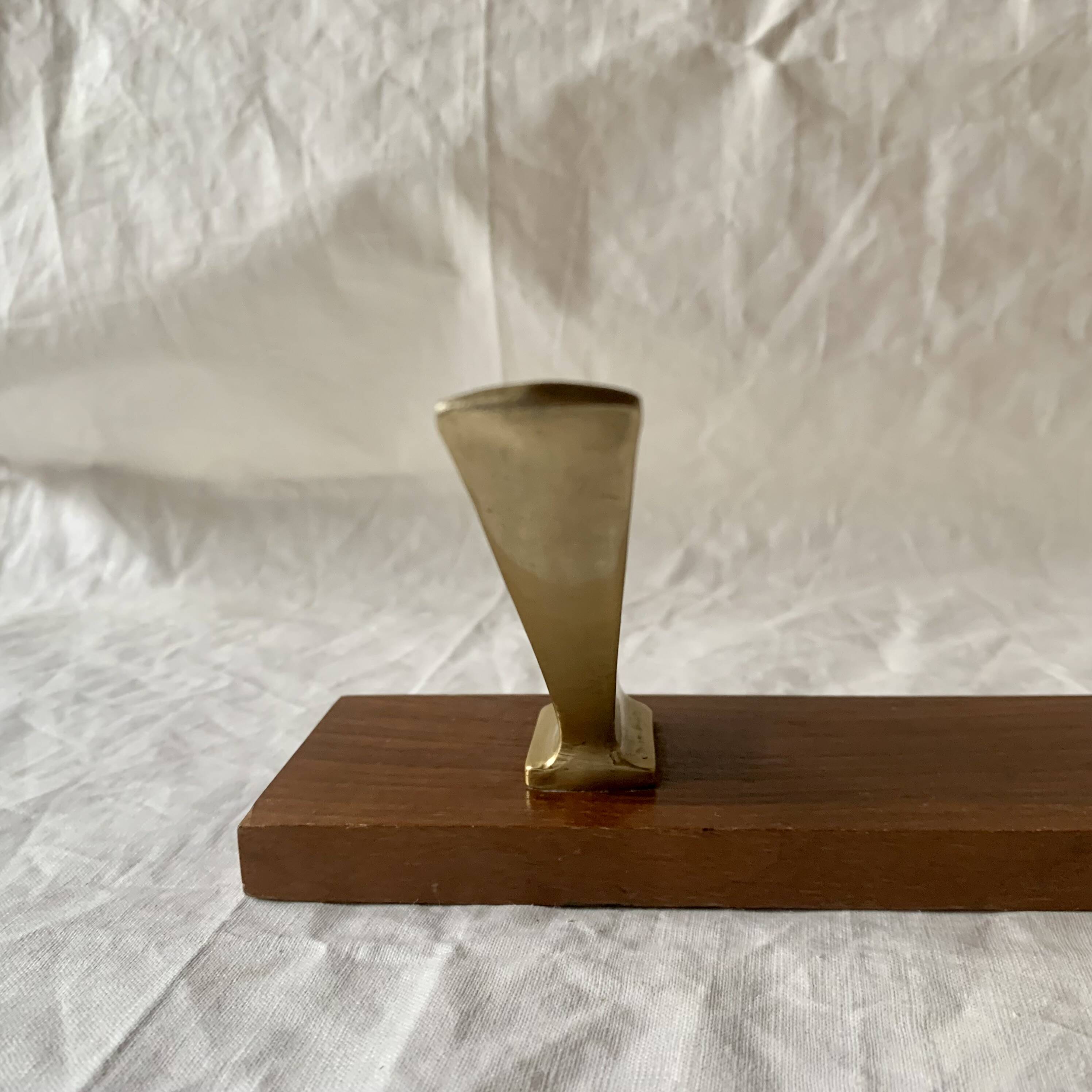 Vintage wooden wall-mounted coat rack with 3 golden cast aluminum hooks