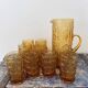 Orangeade service in amber glass 8 glasses and their pitcher