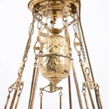 Brass chandelier from the first half of the 20th century.