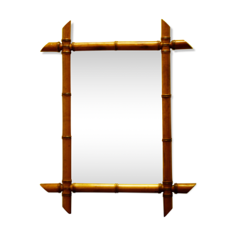Wall mirror with faux bamboo frame