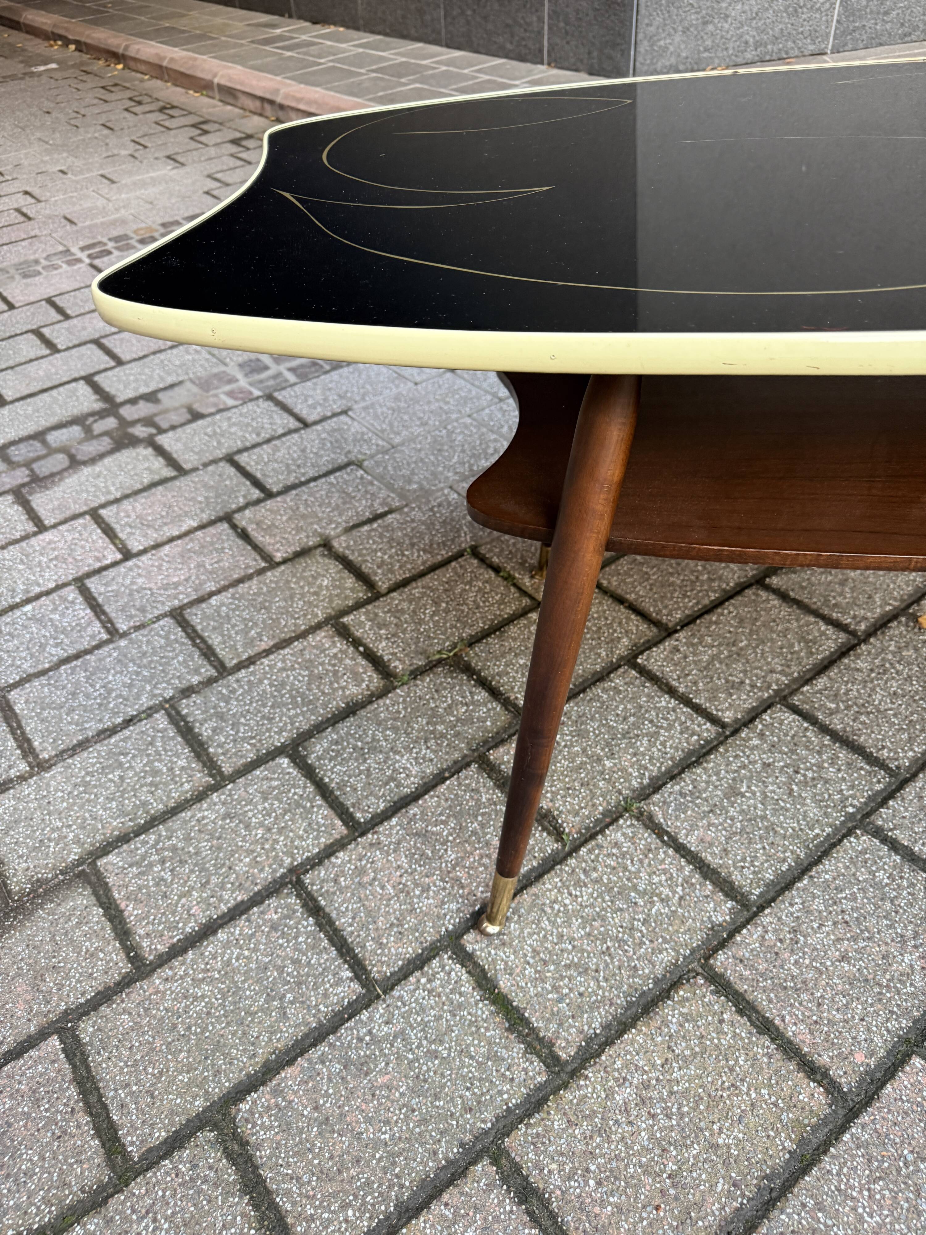 Black glass and wood coffee table