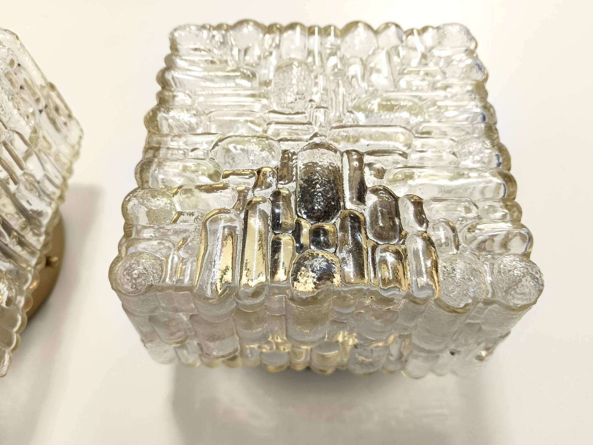 Pair of Square Molded Clear Glass and Gold Varnished Iron Wall Lights
