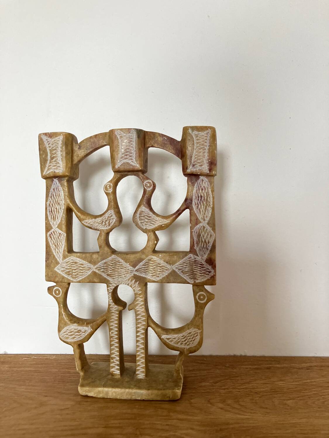 Vintage stone folk art candle holder