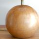 Wooden "ball" lamp, raffia shade, 70s