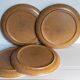 Four vintage glazed stoneware potter's plates