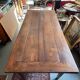 Rustic solid wood table: Elegance and functionality for your family meals, 19th century.